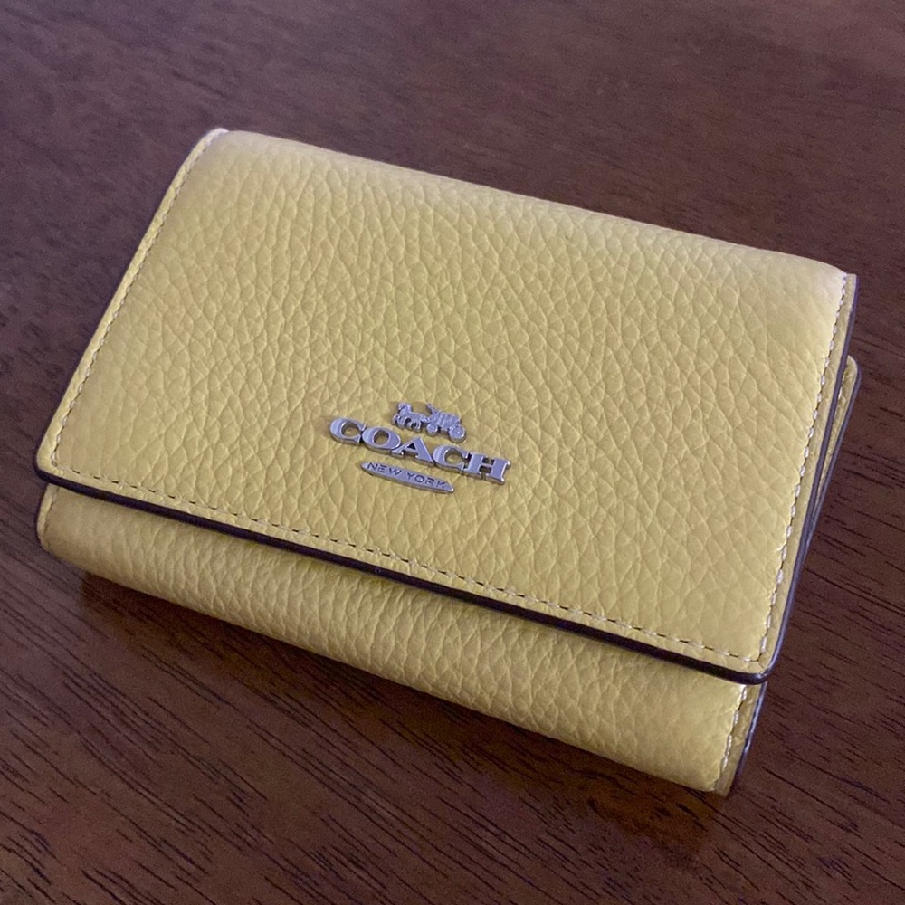 COACH butter yellow trifold wallet